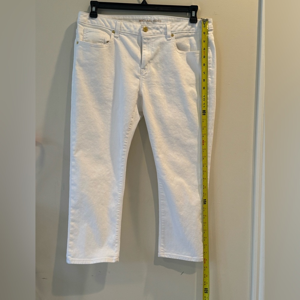 Michael Kori’s white denim cropped jeans. Size 12